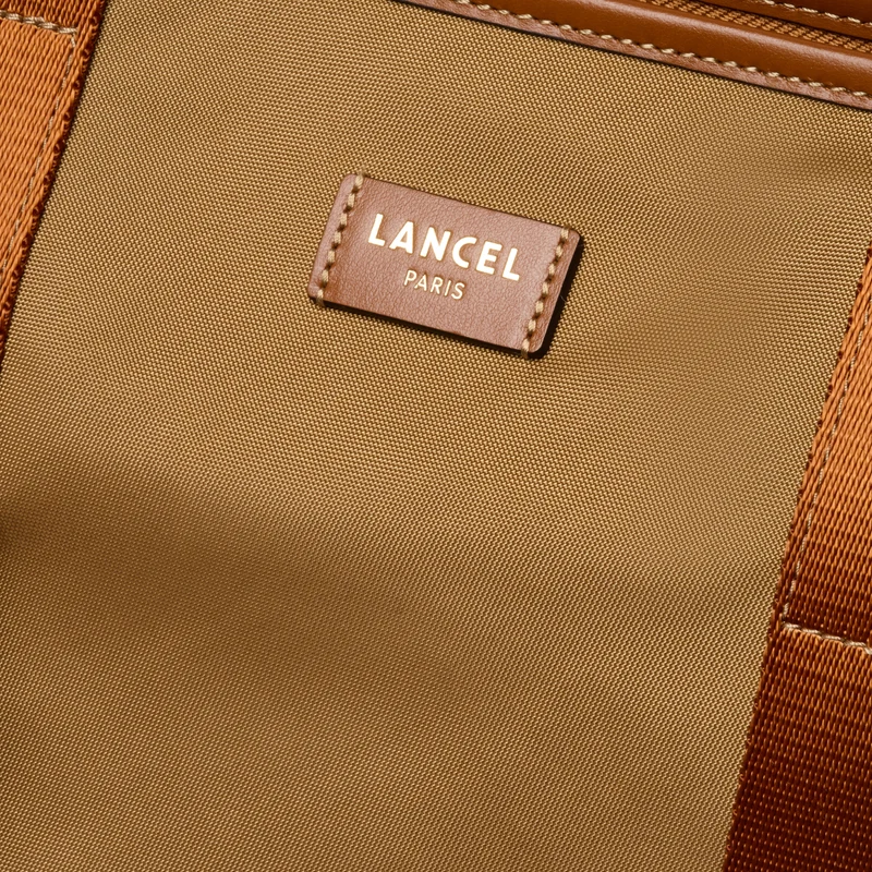 M ZIP TOTE BAG