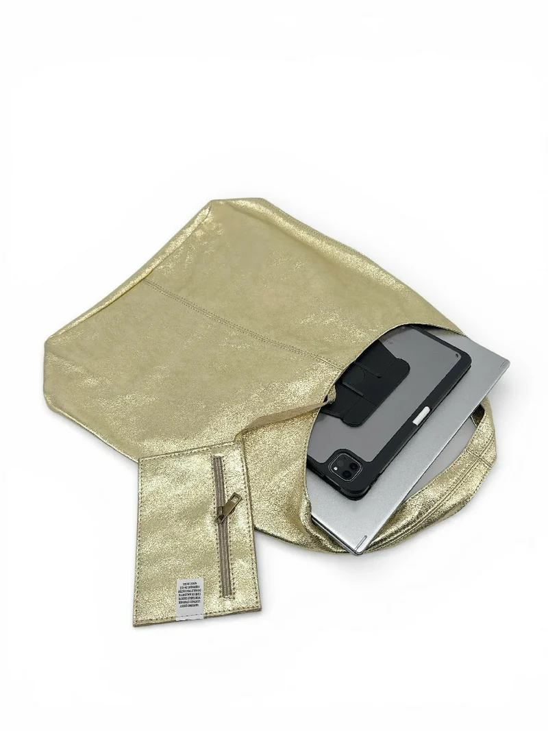 Sac à main HOBO en cuir irisé EVA GLOW Or pâle
