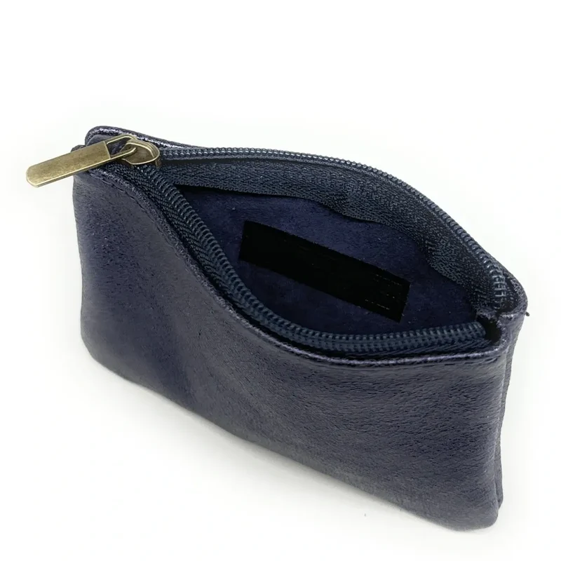 Pochette en cuir irisé GLOW PURSE Bleu nuit étoilée