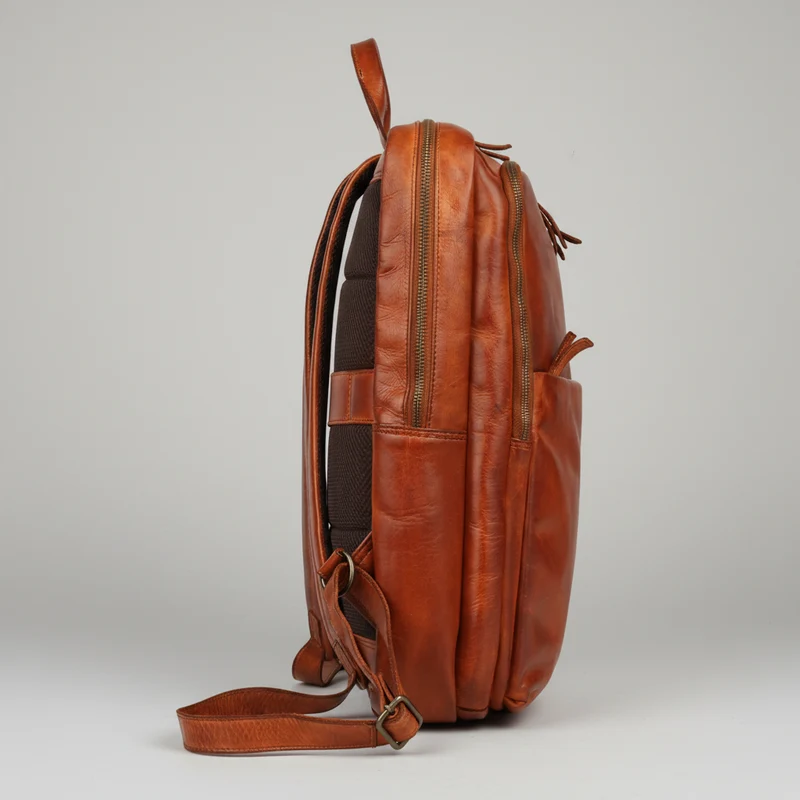MET Two Adjustable Strap Leather Backpack. Multi-Compartment Commuter Pack