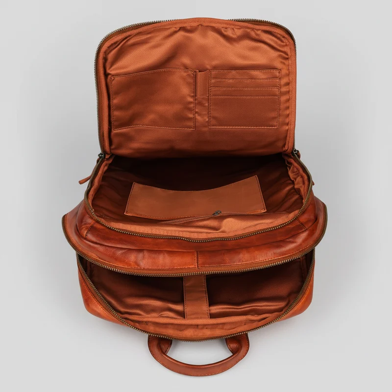 MET Two Adjustable Strap Leather Backpack. Multi-Compartment Commuter Pack